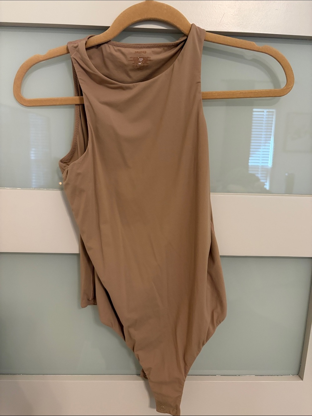 SKIMS Sleeveless Bodysuit in Tan